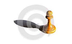 A chess pawn casting a bishop piece shadow concept of strength