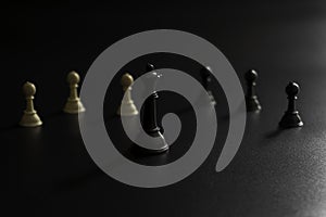 Chess piece standing out from others on light background. Think different business unique independent concept