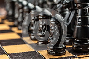 The chess pieces on the board.Chessmaster concept