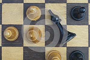 Chess pieces on the chessboard as a prototype of people