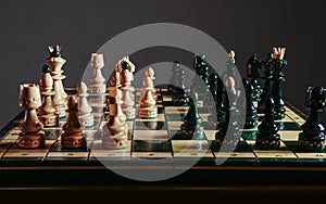 Chess pieces before the game. Chess board on the table