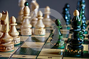 Chess pieces before the game. Chess board on the table