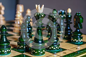 Chess pieces before the game. Chess board on the table. Selective focus