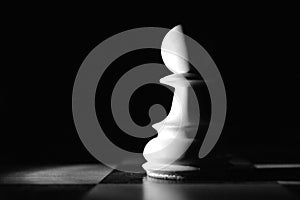 Chess pieces illuminated in the dark
