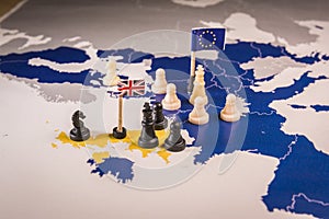 Chess pieces over an european map. Brexit concept