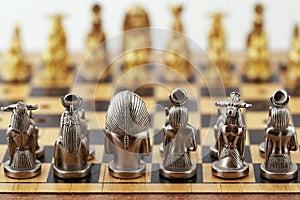 Chess pieces are placed on the board before the start of the game