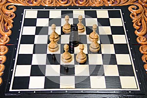 The chess pieces are placed on the chessboard.