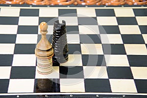 The chess pieces are placed on the chessboard.