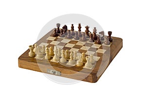 Chess pieces stand on a wooden board close-up isolated on a white background