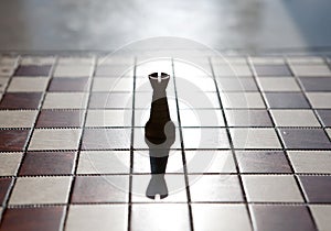 Chess pieces on a table in the park