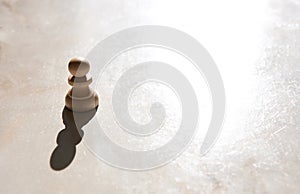 Chess pieces on a table in the park