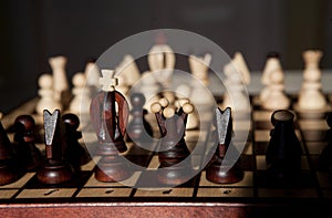 Chess pieces on a table in the park