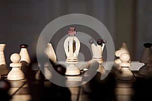 Chess pieces on a table in the park