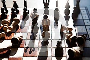 Chess pieces on a table in the park
