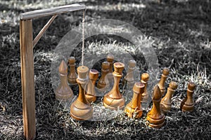 Chess pieces were executed by hanging their king. The concept of revolution, uprising, murder of the king, treason of national