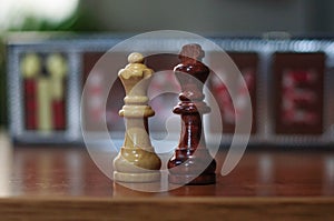 Chess pieces white queen and black king love inscription on background