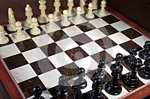 Chess pieces on wood board