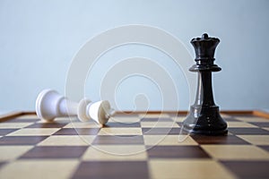 Chess placed on a wooden table,concept : of business strategy and tactic battle,symbol competition game success play victory war