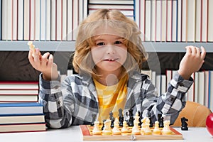 Chess school for kids. Kid thinking about chess. The concept of learning and growing children. Chess, success and