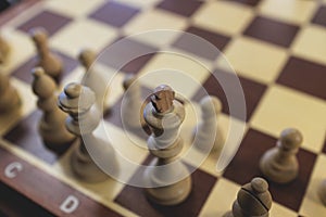 Chess tournament, kids and adults participate in chess match game outdoors in indoor hall, players of all ages play, competition