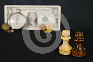 Chess, watches and a banknote.