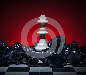 Chess white king won. Black pieces lost