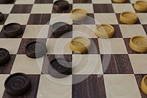 Chessboard and checkers of the game of checkers. photo