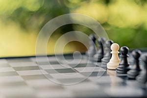 chessboard with a chess piece on the back Negotiating in business. as background business concept and strategy concept with copy