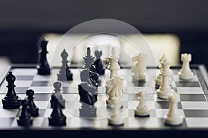 Chessboard with a chess piece on the back Negotiating in business. as background business concept and strategy concept with copy