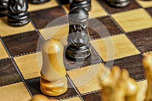 Chessboard figures on the board. To meet each other. checkmate.Game