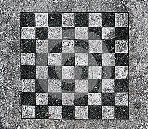 chessboard on a stone table in a public park (brooklyn new york city) chess board checkered squares