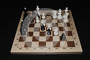 Chessboard under the pieces as a leisure theme