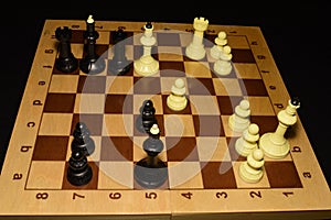 Chessboard and white chessmen as a game background