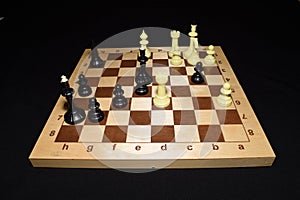 Chessboard and white pieces like a strategy theme