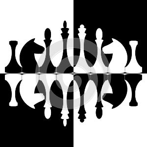 Chessmen on chess background photo