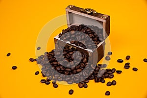 chest with coffee , Image of middle-aged coffee beans. Poured into a pirate chest. Precious, expensive, tonic, invigorating,