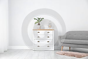 Chest of drawers in stylish living room