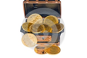 Chest with several gold sovereigns photo