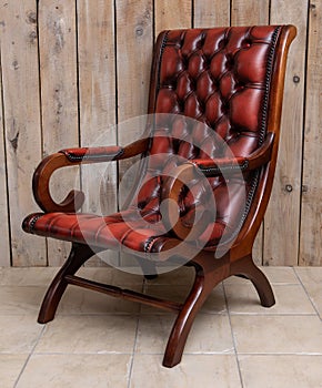 Chesterfield style Slipper Chair in oxblood leather