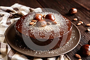 Chestnut cake with almonds and chocolate photo