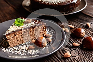 Chestnut cake with almonds and chocolate photo