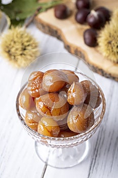 Chestnut dessert and chestnuts on a plate. Traditional delicious Turkish dessert chestnut candies (Kestane Sekeri