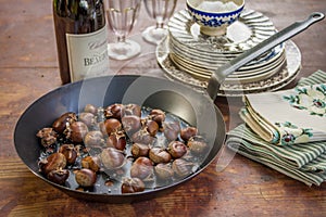 Chestnuts rosted on a pan photo