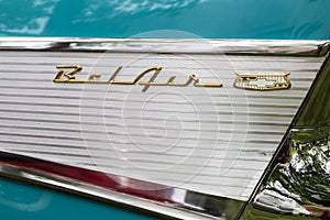 Chevrolet Belair 4dr car 1957 side chrome logo