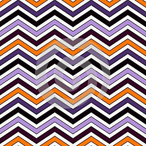 Chevron diagonal stripes background. Seamless pattern in Halloween traditional colors. Zigzag horizontal lines wallpaper