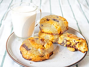 Chewy chocolate chip soft cookies with cup of milk