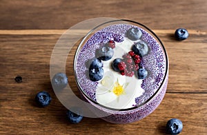 Chia pudding with blueberries, blackberries. Generative AI