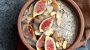 Chia pudding with fresh figs and almonds in a rustic bowl
