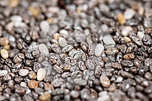 Chia seeds background with selective focus