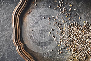 Chia seeds on the old metal tray top view